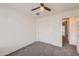 Comfortable bedroom features a closet and a ceiling fan at 2364 N 212Th Ave, Buckeye, AZ 85396