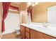 Bathroom featuring double sinks, a shower/tub, and vanity for optimal comfort at 2413 W Kachina Trl, Phoenix, AZ 85041