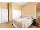 Cozy bedroom featuring a neutral color scheme, plush carpeting, and ample closet space at 2413 W Kachina Trl, Phoenix, AZ 85041