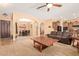 Open floor plan seamlessly connects the living room, dining area, and kitchen, perfect for entertaining at 2413 W Kachina Trl, Phoenix, AZ 85041