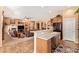 Open-concept layout connecting the kitchen, living room, and dining area, perfect for modern living and entertaining at 2413 W Kachina Trl, Phoenix, AZ 85041