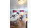 Open-concept living room with comfortable seating, and warm wood floors at 25 S 102Nd St # 92, Mesa, AZ 85208