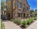Stunning two-story home featuring stone accents, dark shutters, and a well-maintained front yard at 2636 S Bahama Dr, Gilbert, AZ 85295