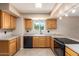 Bright kitchen featuring wood cabinets, recessed lighting, and modern appliances at 3010 E Cortez St, Phoenix, AZ 85028