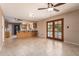 Living room with breakfast bar, and patio access to the pool area at 3010 E Cortez St, Phoenix, AZ 85028