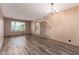 Inviting living room with new hardwood flooring and lots of natural light at 3010 E Cortez St, Phoenix, AZ 85028