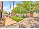 Spacious backyard includes a lush lawn, BBQ area, and patio space for relaxing or entertaining friends and Gathering at 3027 N Nebraska St, Chandler, AZ 85225