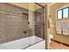 The bathroom includes a tub-shower combination with decorative tile at 3027 N Nebraska St, Chandler, AZ 85225