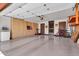 Spacious garage featuring built in cabinets, work space, and an epoxy floor for durable functionality at 3027 N Nebraska St, Chandler, AZ 85225