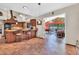 Kitchen bar and view through doorway into game room and living room at 3027 N Nebraska St, Chandler, AZ 85225