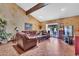 Comfortable living room featuring wood beam and vaulted ceiling with lots of space for entertaining at 3027 N Nebraska St, Chandler, AZ 85225