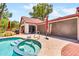 Inviting backyard featuring a pool, jacuzzi, and shade, perfect for relaxing and entertaining at 3027 N Nebraska St, Chandler, AZ 85225