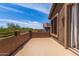 Large covered balcony boasts mountain views and ample space for seating and outdoor living at 3055 N Red Mountain -- # 98, Mesa, AZ 85207