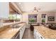 Kitchen and breakfast nook with granite countertops, stainless steel appliances and natural light at 3055 N Red Mountain -- # 98, Mesa, AZ 85207