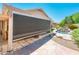 Backyard featuring a powered sunshade that provides shade for the patio and outdoor seating at 30844 N 41St Pl, Cave Creek, AZ 85331