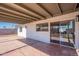 Covered patio with sliding glass door access to the home at 3118 S Los Altos Dr, Mesa, AZ 85202