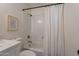 Clean bathroom showcasing shower/tub combo with white fixtures and tile surround at 3118 S Los Altos Dr, Mesa, AZ 85202