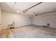Spacious two car garage with neutral paint and automatic openers at 3118 S Los Altos Dr, Mesa, AZ 85202