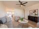 Warm living room with open access to kitchen providing a bright and spacious living area at 3118 S Los Altos Dr, Mesa, AZ 85202