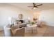 Inviting living room with a ceiling fan, neutral decor, and stylish furnishings creating a comfortable atmosphere at 3118 S Los Altos Dr, Mesa, AZ 85202