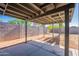 Spacious concrete patio with shade cover, ideal for outdoor entertaining and relaxation at 3118 S Los Altos Dr, Mesa, AZ 85202