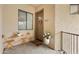 Charming front porch with seating and a decorative floral wreath at 3330 S Gilbert Rd # 2090, Chandler, AZ 85286