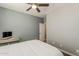 Bedroom featuring a ceiling fan, closet, and natural light at 3422 E Strawberry Dr, Gilbert, AZ 85298