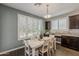 Charming dining area filled with natural light, creating a warm and inviting atmosphere at 3422 E Strawberry Dr, Gilbert, AZ 85298