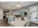 Open concept dining area connects seamlessly to the kitchen and living room at 3422 E Strawberry Dr, Gilbert, AZ 85298