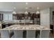This stunning kitchen features a spacious center island perfect for entertaining at 3422 E Strawberry Dr, Gilbert, AZ 85298