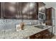 Gourmet kitchen showcases stainless steel appliances and granite countertops at 3422 E Strawberry Dr, Gilbert, AZ 85298