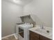 Laundry room featuring a new washer and dryer, and a sink with a cabinet at 3422 E Strawberry Dr, Gilbert, AZ 85298