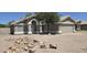Charming single-story home featuring a well-maintained front yard and an attached two-car garage at 3446 N Ravine --, Mesa, AZ 85215