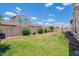 The spacious backyard is fully fenced, providing privacy and security and a large area for gardening at 3458 E Ivanhoe St, Gilbert, AZ 85295