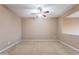 Bedroom with ceiling fan, neutral walls, and carpet flooring, providing a comfortable and relaxing space at 3458 E Ivanhoe St, Gilbert, AZ 85295
