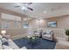 Cozy bonus room showcasing modern furnishings, including comfortable seating and stylish decor at 3458 E Ivanhoe St, Gilbert, AZ 85295