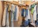 Walk-in closet complete with shelving and clothing racks at 3458 E Ivanhoe St, Gilbert, AZ 85295