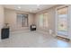 Sunlit dining room features tile flooring, modern blinds, and a door to the exterior at 3458 E Ivanhoe St, Gilbert, AZ 85295