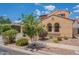 Beautiful house with stucco exterior, two-car garage, and desert-friendly landscaping at 3458 E Ivanhoe St, Gilbert, AZ 85295