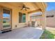 Covered patio with a ceiling fan, and outdoor kitchen with a stainless steel grill at 3458 E Ivanhoe St, Gilbert, AZ 85295