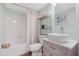 Bathroom featuring a combination tub and shower with a pedestal sink and silver accents at 3500 N Hayden Rd # 2110, Scottsdale, AZ 85251