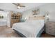 Bright bedroom with ceiling fan, wooden floors, and neutral decor at 3500 N Hayden Rd # 2110, Scottsdale, AZ 85251