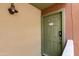 A close up of a unit front door showcasing the unit number, hardware and exterior light at 3500 N Hayden Rd # 2110, Scottsdale, AZ 85251