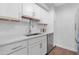 Modern kitchen features white cabinets, stainless steel appliances, and a sleek countertop at 3500 N Hayden Rd # 2110, Scottsdale, AZ 85251