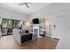 Living room with sliding glass doors that provide access to a private balcony and lots of natural light at 3500 N Hayden Rd # 2110, Scottsdale, AZ 85251