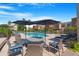 Community pool with seating at 3500 N Hayden Rd # 2110, Scottsdale, AZ 85251