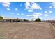 Spacious backyard featuring a pool, ample land, and outdoor structures at 3658 E Pony Track Ln, San Tan Valley, AZ 85140