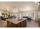 Open kitchen with a large island perfect for entertaining, connecting seamlessly to the living area and backyard at 3658 E Pony Track Ln, San Tan Valley, AZ 85140