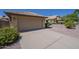 Exterior shot of the driveway leading to a two-car garage at 4248 E Jason Dr, Phoenix, AZ 85050