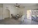 Comfortable living room with view to backyard and modern ceiling fan at 4248 E Jason Dr, Phoenix, AZ 85050